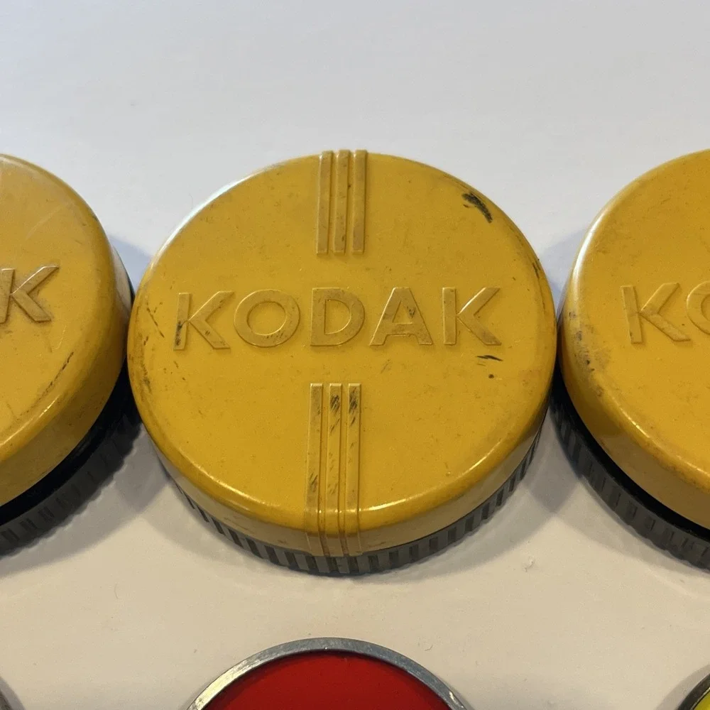 4 Kodak lens cases,3 Wratten lens, 1 Kodak lens and 1 Ednalite lens & pouch-used